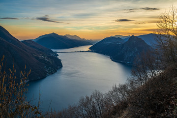 Evening sunset over Lake Lugano in swiss Alps, Ticino, Switzerland