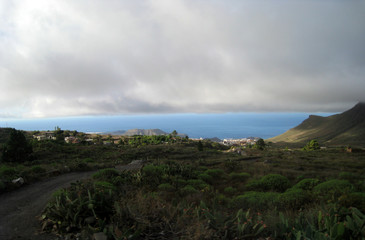  landscape with mountains, clouds and ocean