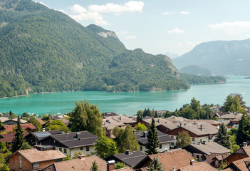 Village of Gosau with its wooden houses in the Alps of Austria on a sunny day.