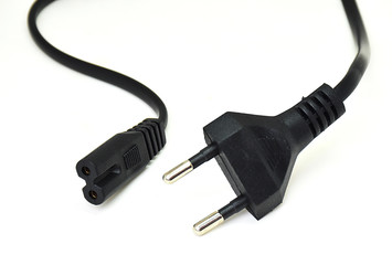 Isolated electric wire with plug and socket on white background