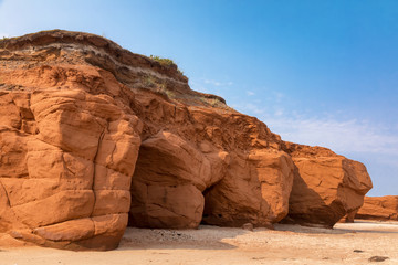 The red cliffs and beach of  Havre aux Maisons