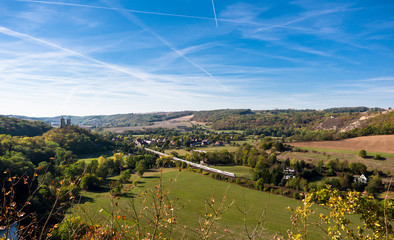 Panoramic view of the village of Saalek and train in the valley of the river Saale. Tourist place Sachsen-Anhalt, Germany.