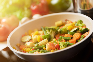 Fresh vegetables fried in a pan. Healthy nutrition concept