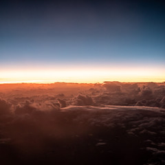 Sunset above the clouds