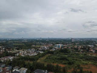 Aerial view of park and buildings around BSD city, Tangerang, Indonesia.