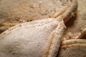 Roasted and salted pumpkin seeds. Close up, macro photos.