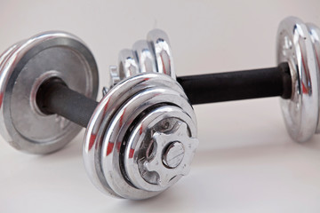 Naklejka premium Fitness exercise equipment dumbbell weights on white background