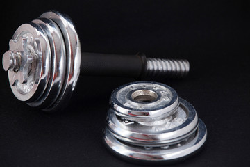 dumbbells on a black background