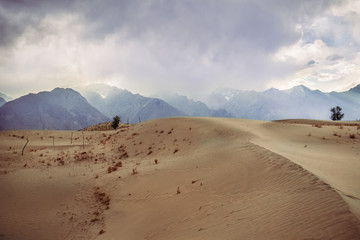 View of sunset and cloudy sky at the Katpana cold desert Skardu, Gilgit Baltistan, Pakistan.