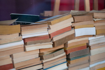 Fototapeta premium closeup of books pile in Bookstore