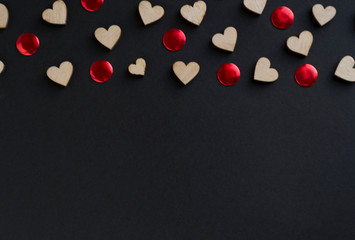 Black background with red hearts, there is a place for text.