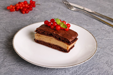 Chocolate souffle cakes, decorate red currants