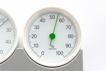 modern, round barometer, thermometer, hygrometer. Analog device for measuring humidity, temperature and atmospheric pressure.