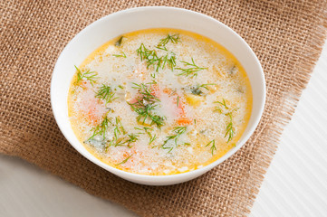 the white plate with fish soup