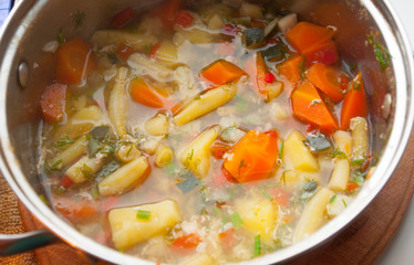 the saucepan with healthy vegetable soup