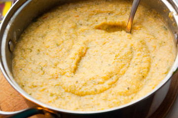 the saucepan with healthy vegetable soup puree
