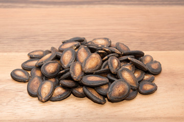 Watermelon seed on wood backgrounds