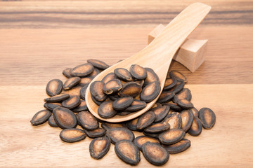 Watermelon seed on wood backgrounds