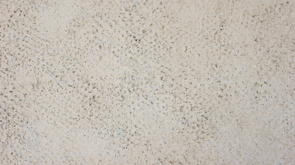 the surface of the concrete slab of the building facade