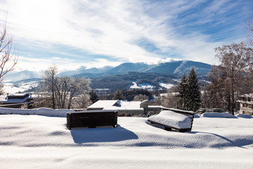Majestic sunset in the winter mountains landscape. Dramatic sky.