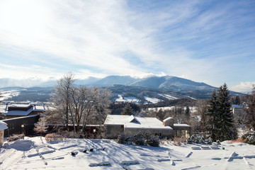 Majestic sunset in the winter mountains landscape. Dramatic sky.