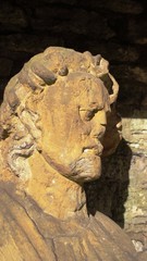 Obraz premium Statue auf der Sparrenburg Bielefeld,tone, ancient, sculpture, temple, old, art, asia, architecture, wood, statue, relief, texture, rock, abstract, religion, sri lanka, carving, cambodia, face,