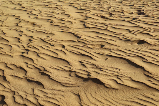 Artistic sand ripple pattern of Huacachina desert in Ica region, Peru, South America