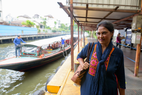 Indian Woman At Canal Boat Station In Bangkok Thailand