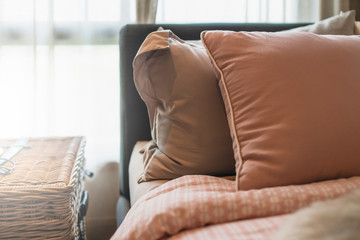 Bed maid-up with clean white pillows and bed sheets in beauty bedroom. Close-up. interior background