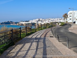 Street in Albufeira in Portugal along beneath the ocean