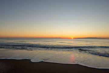 Fototapeta premium Sunrise on a beach in Denia, Alicante