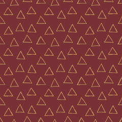 Triangle seamless pattern. Vector golden and burgundy background. Scrapbook, gift wrapping paper, textiles. Doodle sketch