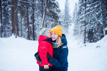 Fototapeta na wymiar family winter fun - mother and child