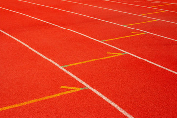 Fototapeta premium Red running track Synthetic rubber on the athletic stadium.