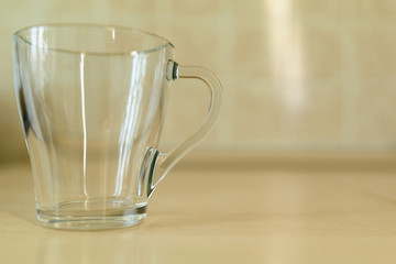 transparent glass mug with handle for hot tea and coffee