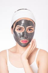 beautiful woman masking her face on white background