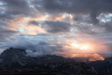 Reaching the sky. Awesome wide view of the sunset lights illuminate the clouds and creates yellow colored landscape