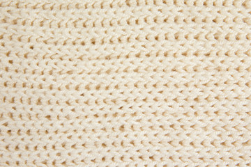 White knitted woolen fabric textile background. Horizontal lines.