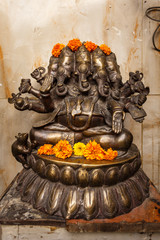 Ancient sculpture of the god Ganesh. Culture and Beliefs of India.