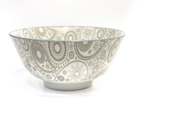 blue pattern of Turkish cucumber on a white plate bowl on white background