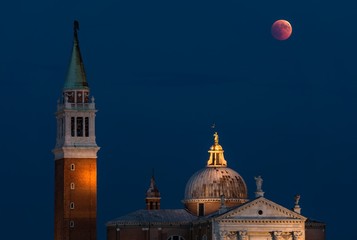 Fototapeta na wymiar Italy beauty, late evening San Giorgio Maggiore island and the moon in Venice, Venezia