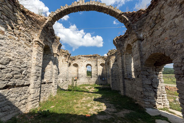 Fototapeta na wymiar Abandoned Medieval Eastern Orthodox church of Saint John of Rila at the bottom of Zhrebchevo Reservoir, Sliven Region, Bulgaria