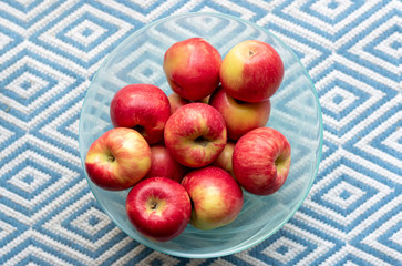 A bowl of apples shot from overhead