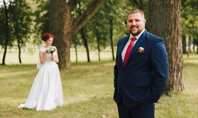 Happy couple.Wedding photo.Newlyweds on a walk