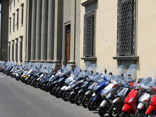 Motor scooters parked in Florence, Italy