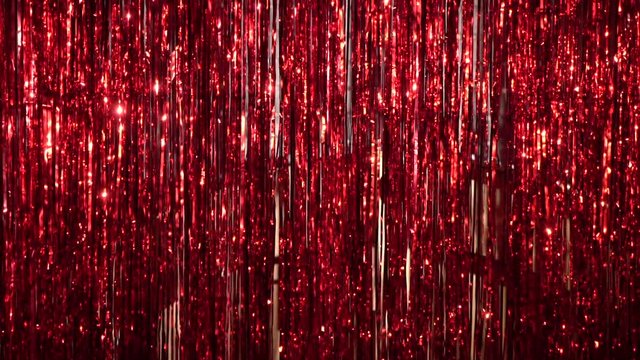 Background - shiny red festive tinsel