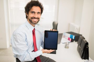 Man showing a tablet