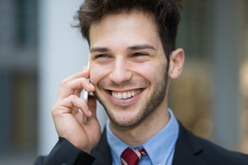 Portrait of a businessman talking on the phone