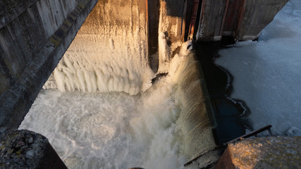 The dam is covered with ice