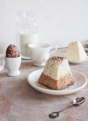 Easter background. Traditional Easter holiday table: cake, Easter and Easter eggs.